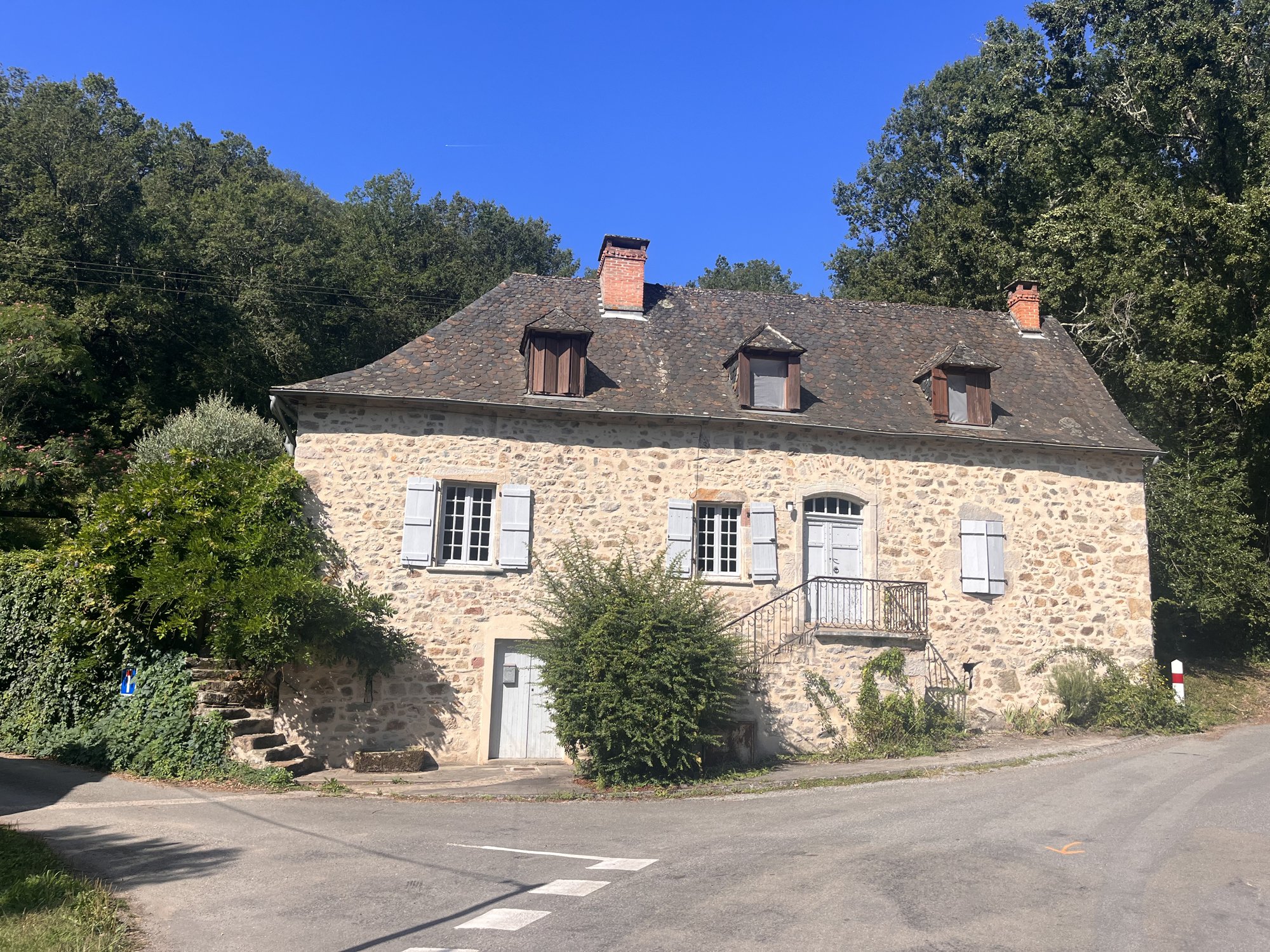 The stone farmhouse in summer