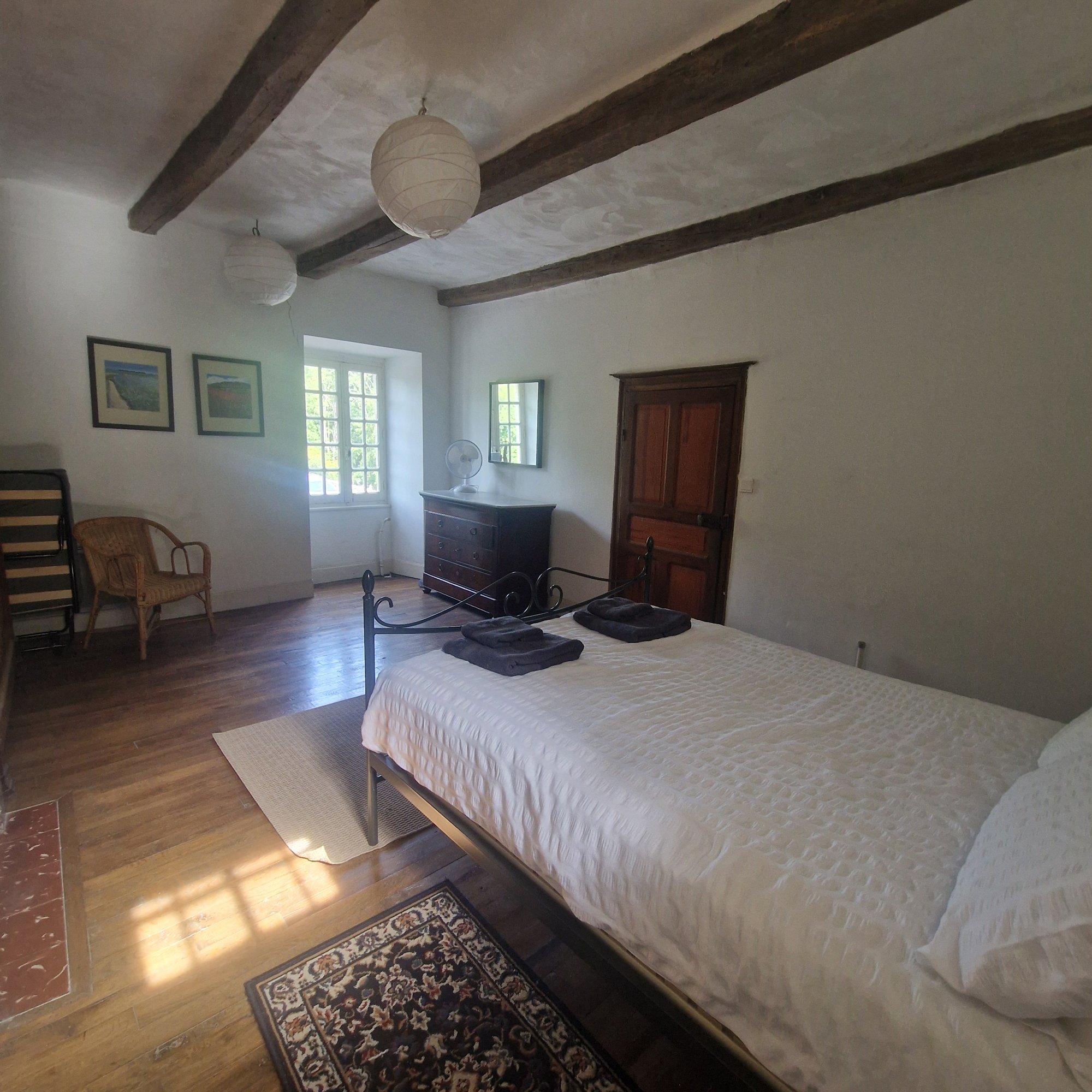 A double bedroom under the beams